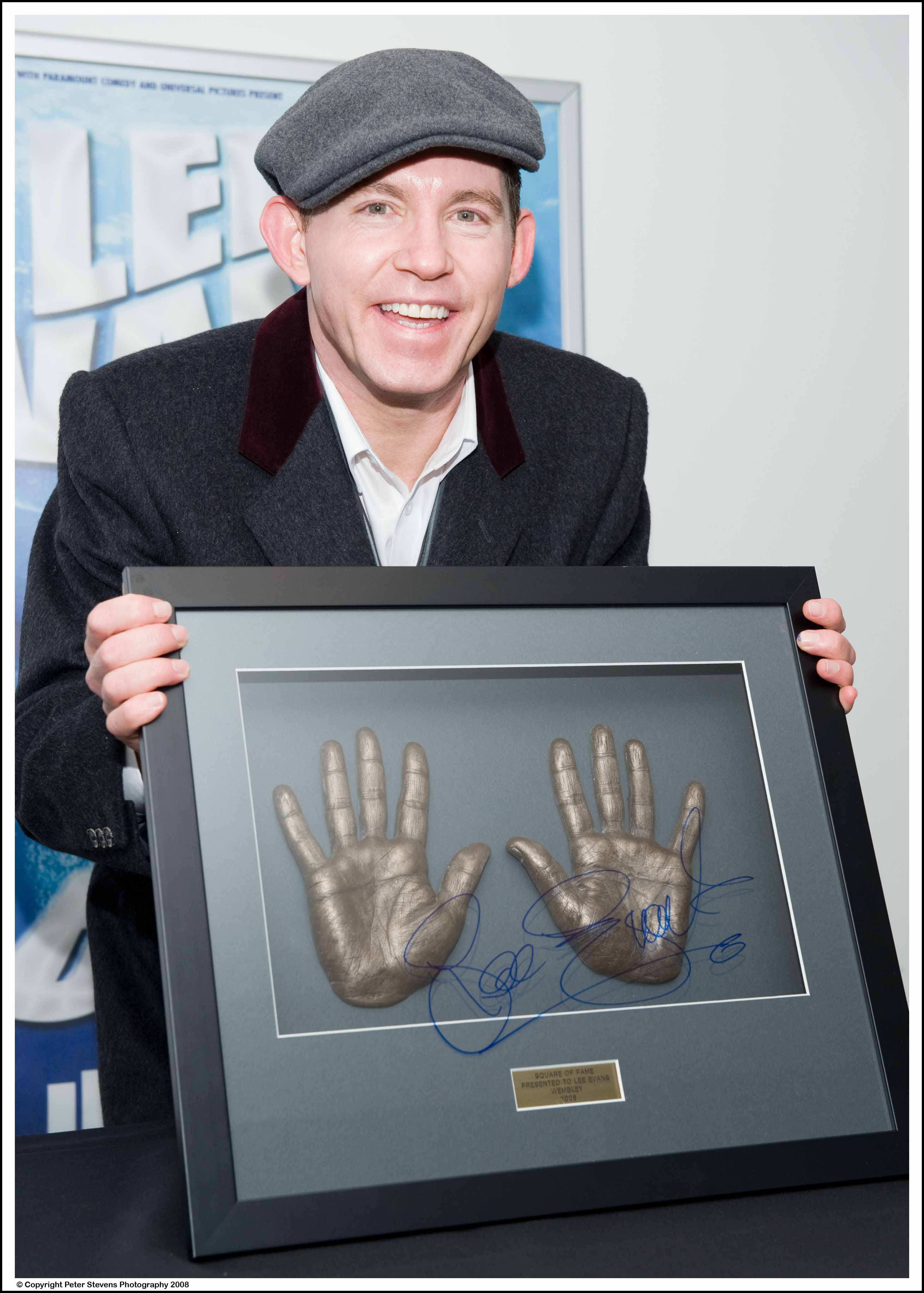 Lee Evans with handprints