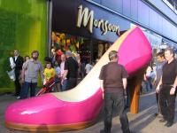 Shoe being installed on Oxford St London