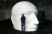 Steve next to the giant head